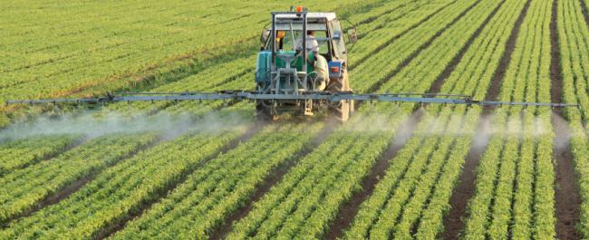 tractor spraying fertilizer